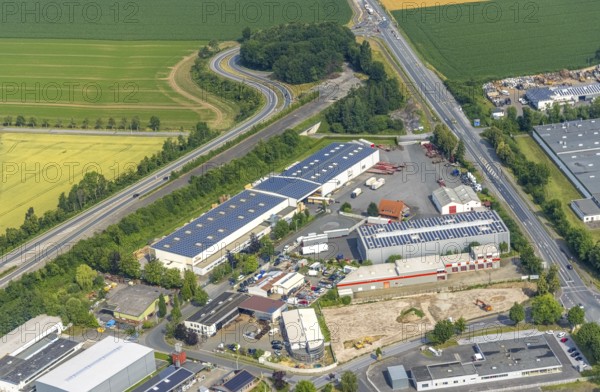 Aerial view, commercial area Hammer Straße, HolzTec GmbH with solar roof, Budberg, Werl, Soester Börde, North Rhine-Westphalia, Germany, DE, Europe, commercial enterprises, commercial area, commercial park, commercial location, commercial use, industrial area, industrial building, industrial location, aerial photograph, aerial photography, aerial photography, photovoltaic, photovoltaic system, solar, solar system, solar roof, solar energy, solar energy, overview, bird's eye view, birds-eyes view, overview