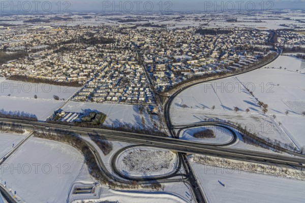 Aerial view, overview Werl, motorway junction AS59 Werl-Zentrum at the motorway A445, parking Werl-Büderich, winter, snow, Werl, Soester Börde, North Rhine-Westphalia, Germany, Soester, Börde, DE, Europe, birds-eyes, view, aerial view, aerial photography, aerial photography, overview, overview, bird's eye view, A445, junction, AS59, transport, traffic, infrastructure, logistics, road traffic