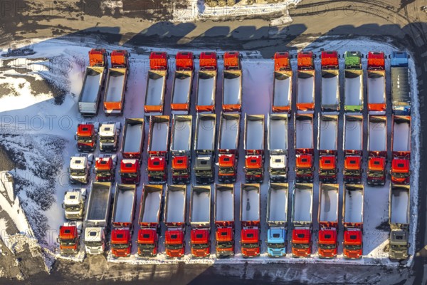 Aerial view, industrial estate KonWerl, winter, snow, Mimberg Spedition-Baustoffe GmbH & Co. KG, red lorry with loading area, Werl, Soester Börde, North Rhine-Westphalia, Germany, Soester, Börde, DE, Europe, birds-eyes, view, aerial view, aerial photography, aerial photography, overview, overview, bird's eye view, KonWerl, industry, trade, economy, commercial enterprise, production, trade