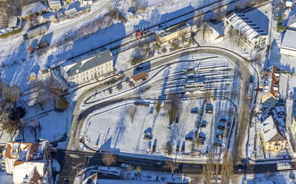 Aerial view, railway station, railway tracks, bus station, winter, snow, Werl, Soester Börde, North Rhine-Westphalia, Germany, Soester, Börde, DE, Europe, birds-eyes, view, aerial view, aerial photography, aerial photography, overview, overview, bird's eye view, train traffic, railway traffic, transport connection, travel, holiday, railway line, railway network, infrastructure, transport, freight traffic, railway network