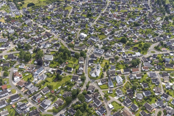 Aerial view, city centre view and Roman Catholic parish church of St. Kunibertus, Hünsborn, Wenden, Sauerland, North Rhine-Westphalia, Germany, place of worship, DE, monument protection, Europe, religious community, place of worship, holy place, church, parish, denomination, aerial view, aerial photography, aerial photography, religion, religious site, overview, bird's-eye view, overview