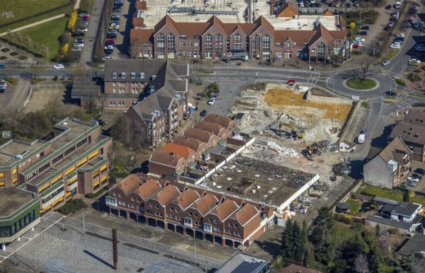 Aerial view, town hall, construction site and demolition for new business centre at the town hall square, Voerde, Ruhr area, Lower Rhine, North Rhine-Westphalia, Germany, demolition work, construction work, construction area, building site, building plots, construction project, construction site, authority, DE, Europe, aerial view, aerial photography, aerial photography, market place, town hall square, overview, bird's eye view, weekly market market, birds-eyes view, overview