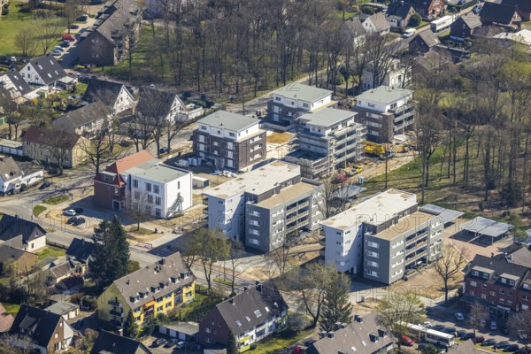 Aerial view, construction site and new residential neighbourhood, Bahnhofstraße corner Alexanderstraße, old Pestalozzi school site, Voerde, Ruhr area, Lower Rhine, North Rhine-Westphalia, Germany, construction, construction area, construction site, construction crane, construction project, construction site, DE, renewal, development, Europe, property tax, real estate, aerial view, aerial photography, aerial photography, apartment blocks, new build, overview, bird's-eye view, housing and living, residential buildings, residential neighbourhood, housing estate, housing shortage, birds-eyes view, overview