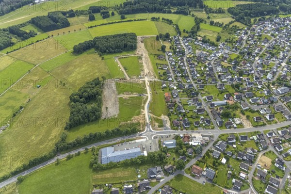 Aerial view, construction site, new development area An der Wahre, for residential buildings, Siegener Straße, Hünsborn, Wenden, Sauerland, North Rhine-Westphalia, Germany, construction work, construction area, building site, building plots, construction project, construction site, DE, Europe, aerial view, aerial photography, aerial photography, overview, bird's-eye view, overview
