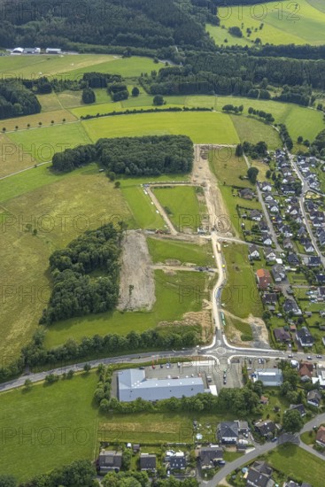 Aerial view, construction site, new development area An der Wahre, for residential buildings, Siegener Straße, Hünsborn, Wenden, Sauerland, North Rhine-Westphalia, Germany, construction work, construction area, building site, building plots, construction project, construction site, DE, Europe, aerial view, aerial photography, aerial photography, overview, bird's-eye view, overview