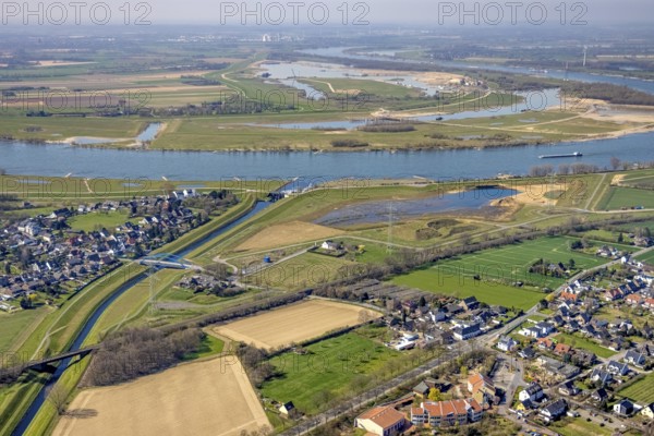 Aerial view, Rhine dyke construction site, Emscher estuary, Emscher estuary drop structure, Emscher bridge Hagelstraße, Rheinaue Walsum, river Emscher, river Rhine, Möllen, Voerde, Ruhr area, Lower Rhine, North Rhine-Westphalia, Germany, DE, Emscher, Emscher estuary into the Rhine, Emscher conversion, Europe, aerial view, aerial photography, aerial photography, Rhine, Rhine floodplain, overview, bird's-eye view, meadows and fields, birds-eyes view, overview