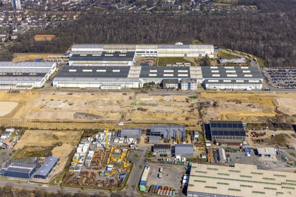 Aerial view, construction site Am Industriepark, Friedrichsfeld, Voerde, Ruhr area, Lower Rhine, North Rhine-Westphalia, Germany, construction work, construction area, construction site, building plots, construction project, construction site, DE, Europe, Flender, commercial enterprises, commercial area, commercial park, commercial site, commercial use, industrial area, industrial site, aerial photograph, aerial photography, aerial photography, overview, bird's-eye view, Winernergy, birds-eyes view, overview