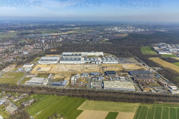 Aerial view, construction site Am Industriepark, Friedrichsfeld, Voerde, Ruhr area, Lower Rhine, North Rhine-Westphalia, Germany, construction work, construction area, construction site, building plots, construction project, construction site, DE, Europe, Flender, commercial enterprises, commercial area, commercial park, commercial site, commercial use, industrial area, industrial site, aerial photograph, aerial photography, aerial photography, overview, bird's-eye view, Winernergy, birds-eyes view, overview