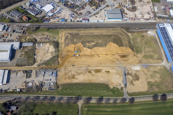 Aerial view, embankments and construction site Böskenstraße for new company settlements, Emmelsum, Voerde, Ruhr area, Lower Rhine, North Rhine-Westphalia, Germany, construction work, construction vehicles, construction area, construction site, building plots, construction project, construction site, DE, Europe, logistics, logistics service provider, logistics provider, logistics centre, aerial view, aerial photography, aerial photography, overview, bird's eye view, birds-eyes view, overview