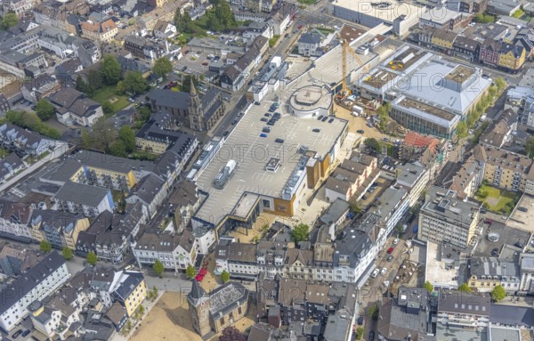 Aerial view, construction site at Forum Niederberg, cultural and event centre, StadtGalerie Velbert, St. Marien Kirche, Velbert, Ruhr area, North Rhine-Westphalia, Germany, place of worship, construction work, construction area, building site, building plots, construction crane, construction project, construction site, DE, shopping centre, shopping square, shopping mall, Europe, religious community, place of worship, holy place, church, parish, denomination, convention centre, culture, art, aerial view, aerial photography, aerial photography, religion, religious site, shopping, shopping centre, overview, events, venue, event location, event centre, bird's-eye view, birds-eyes view, cultural use, overview