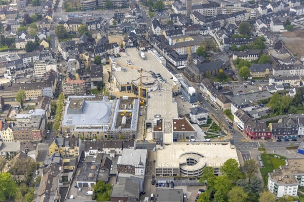 Aerial view, construction site at Forum Niederberg, cultural and event centre, StadtGalerie Velbert, St. Marien Kirche, Velbert, Ruhr area, North Rhine-Westphalia, Germany, place of worship, construction work, construction area, building site, building plots, construction crane, construction project, construction site, DE, shopping centre, shopping square, shopping mall, Europe, religious community, place of worship, holy place, church, parish, denomination, convention centre, culture, art, aerial view, aerial photography, aerial photography, religion, religious site, shopping, shopping centre, overview, events, venue, event location, event centre, bird's-eye view, birds-eyes view, cultural use, overview
