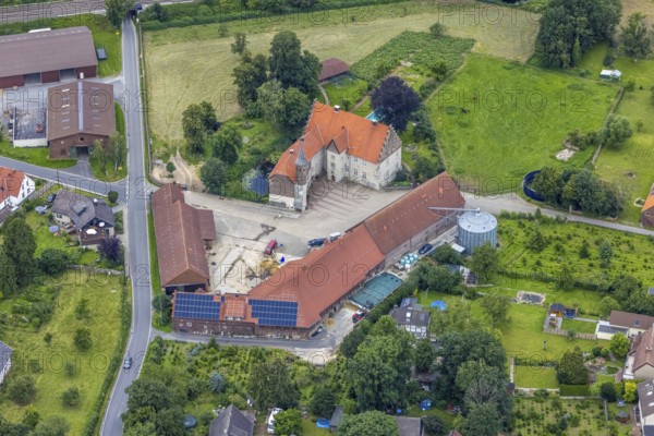 Aerial view, architectural monument, Haus Westhemmerde, farm, Westhemmerde, Unna, Ruhr area, North Rhine-Westphalia, Germany, architectural monument, DE, monument protection, Europe, manorial building, farm, aerial view, aerial photography, aerial photography, photovoltaic, photovoltaic system, castle, solar, solar system, solar roof, solar energy, solar energy, overview, bird's eye view, moat, moated castle, moated castle, birds-eyes view, former aristocratic residence, overview