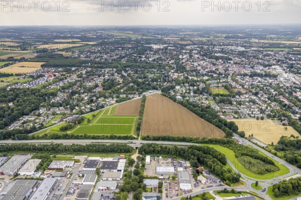 Aerial view, planned photovoltaic area Max-Planck-Straße at the industrial park Unna at the motorway A44, Unna, Ruhr area, North Rhine-Westphalia, Germany, DE, Europe, distant view, shapes and colours, aerial view, aerial photography, aerial photography, photovoltaics, photovoltaic plant, solar, solar plant, solar roof, solar energy, solar park, overview, bird's eye view, meadows and fields, birds-eyes view, overview