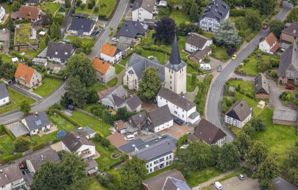 Aerial view, protestant church Lünern with town centre Lünern, Unna, Ruhr area, North Rhine-Westphalia, Germany, place of worship, DE, Europe, religious community, place of worship, property tax, holy place, real estate, church, parish, denomination, aerial view, aerial photography, aerial photography, religion, religious site, overview, bird's-eye view, housing estate, living and life, residential area, residential buildings, housing quality, housing estate, birds-eyes view, overview