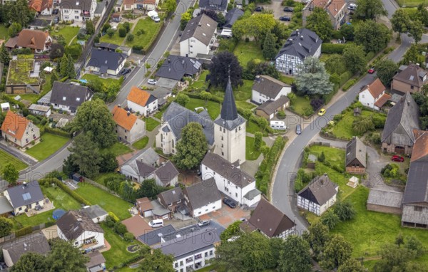 Aerial view, protestant church Lünern with town centre Lünern, Unna, Ruhr area, North Rhine-Westphalia, Germany, place of worship, DE, Europe, religious community, place of worship, property tax, holy place, real estate, church, parish, denomination, aerial view, aerial photography, aerial photography, religion, religious site, overview, bird's-eye view, housing estate, living and life, residential area, residential buildings, housing quality, housing estate, birds-eyes view, overview
