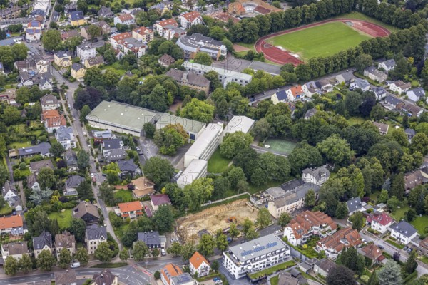 Aerial view, Peter-Weiss-Gesamtschule, construction site at Kessebürener Weg, Unna, Ruhr area, North Rhine-Westphalia, Germany, construction work, construction area, building site, building plots, construction measure, construction project, construction site, education, educational institution, DE, Europe, football pitch, comprehensive school, educational institute, aerial view, aerial photography, aerial photography, school, sports field, overview, bird's eye view, overview