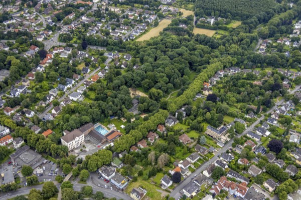 Aerial view, Katharinenschule and outdoor swimming pool Bornekamp with park, Unna, Ruhr area, North Rhine-Westphalia, Germany, bathing establishment, bathing resort, education, educational institution, DE, Europe, outdoor swimming pool, educational institute, aerial view, aerial photography, aerial photography, park, school, swimming pool, overview, bird's-eye view, forest, birds-eyes view, overview