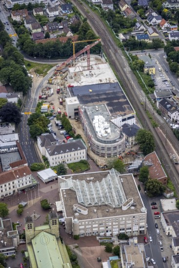 Aerial view, construction site and new building shopping centre, former site Mühle Bremme, town hall, Unna, Ruhr area, North Rhine-Westphalia, Germany, construction work, construction area, construction site, building plots, construction project, construction site, authority, DE, shopping centre, Europe, Kantstraße, aerial view, aerial photography, aerial photography, new building, post office stairs, city administration, overview, bird's-eye view, overview
