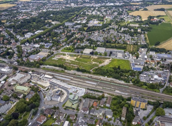 Aerial view, Unna railway station, Viktoriastrasse construction area for office building, Unna, Ruhr area, North Rhine-Westphalia, Germany, railway tracks, railway station, station forecourt, construction work, construction area, construction site, building plots, construction project, construction site, DE, Deutsche Bahn AG, Europe, main station, main station, Kantstrasse, junction station, aerial view, aerial photography, aerial photography, postal stairs, overview, bird's eye view, bird's eye view, overview