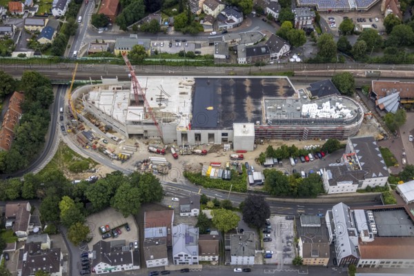 Aerial view, construction site and new building shopping centre, formerly Mühle Bremme site, Unna, Ruhr area, North Rhine-Westphalia, Germany, construction work, construction area, construction site, building plots, construction measure, construction project, construction site, DE, shopping centre, Europe, Kantstraße, aerial view, aerial photography, aerial photography, new building, postal stairs, overview, bird's eye view, overview