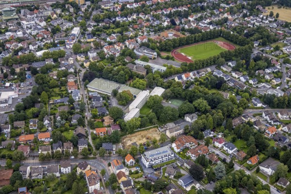 Aerial view, Peter-Weiss-Gesamtschule, construction site at Kessebürener Weg, Unna, Ruhr area, North Rhine-Westphalia, Germany, construction work, construction area, building site, building plots, construction measure, construction project, construction site, education, educational institution, DE, Europe, football pitch, comprehensive school, educational institute, aerial view, aerial photography, aerial photography, school, sports field, overview, bird's eye view, overview