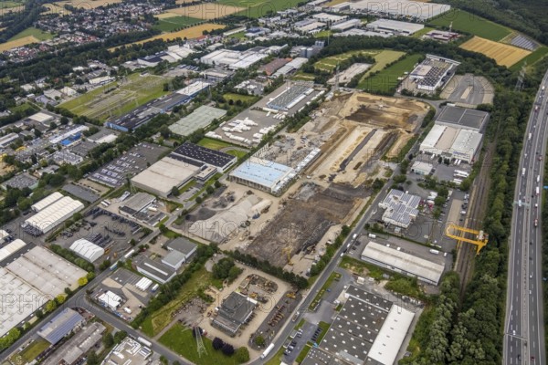 Aerial view, construction site and new building on Otto-cock-Straße in Unna Industrial Park, Unna, Ruhr area, North Rhine-Westphalia, Germany, construction work, construction area, construction site, building plots, construction project, construction site, DE, Europe, commercial enterprises, commercial area, commercial park, commercial site, commercial use, industrial area, industrial building, industrial site, aerial photograph, aerial photography, aerial photography, new building, overview, bird's eye view, birds-eyes view, overview