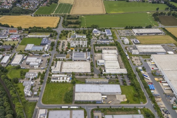 Aerial view, company building PVS / Westfalen-Süd rkV medical billing, Stadtwerke Unna, commercial area Physikerstraßen, Ülzen, Unna, Ruhr area, North Rhine-Westphalia, Germany, DE, Europe, shapes and colours, commercial enterprises, commercial area, commercial park, commercial location, commercial use, industrial area, industrial location, aerial view, aerial photography, aerial photography, photovoltaic, photovoltaic system, solar, solar system, solar roof, solar energy, solar energy, overview, bird's-eye view, birds-eyes view, overview