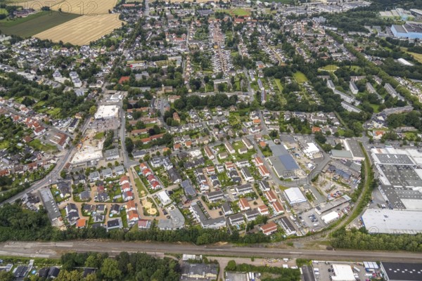 Aerial view, construction site and new construction Aldi supermarket Kamener Straße, Rewe supermarket, terraced houses in Friedrichstraße, Königsborn, Unna, Ruhr area, North Rhine-Westphalia, Germany, construction work, construction, construction area, building site, building plots, construction project, construction site, DE, shopping centres, shopping plaza, shopping centre, Europe, property tax, real estate, aerial view, aerial photography, aerial photography, local supply centre, new building, terraced houses, supermarket, overview, bird's-eye view, residential area, residential buildings, residential quality, residential quarter, housing estate, birds-eyes view, overview