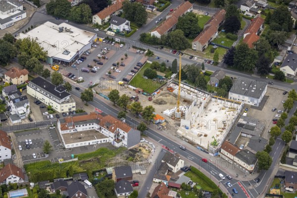 Aerial view, construction site and new building Aldi supermarket Kamener Straße, Rewe supermarket, Königsborn, Unna, Ruhr area, North Rhine-Westphalia, Germany, construction work, building, construction area, building site, building plots, construction project, construction site, DE, shopping markets, shopping square, shopping centre, Europe, aerial view, aerial photography, aerial photography, local supply centre, new building, supermarket, overview, bird's eye view, bird's eye view, overview