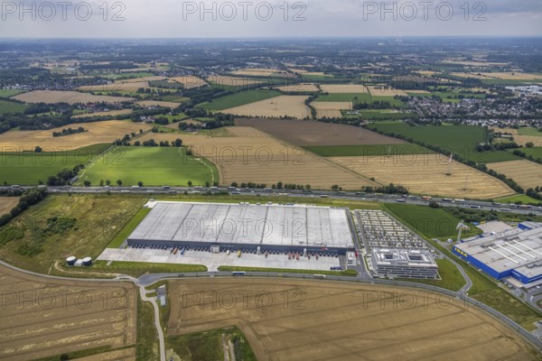 Aerial view, new Woolworth headquarters and logistics centre, commercial area Unna Kamen, Afferde, Unna, Ruhr area, North Rhine-Westphalia, Germany, DE, Europe, commercial enterprises, commercial area, commercial park, commercial location, commercial use, industrial area, industrial building, industrial location, logistics, logistics service, logistics service provider, logistics provider, logistics centre, aerial photograph, aerial photography, aerial photography, overview, bird's-eye view, birds-eyes view, overview