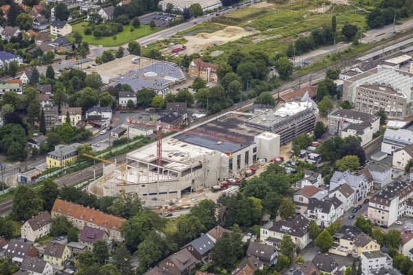 Aerial view, construction site and new building shopping centre, formerly Mühle Bremme site, Unna, Ruhr area, North Rhine-Westphalia, Germany, construction work, construction area, construction site, building plots, construction measure, construction project, construction site, DE, shopping centre, Europe, Kantstraße, aerial view, aerial photography, aerial photography, new building, postal stairs, overview, bird's eye view, overview