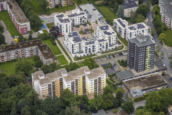 Aerial view, Parkquartier Königsborn, new building Potsdamer Straße with solar roof, Königsborn, Unna, Ruhr area, North Rhine-Westphalia, Germany, DE, Europe, shapes and colours, property tax, high-rise buildings, real estate, aerial view, aerial photography, aerial photography, new building, photovoltaic, photovoltaic system, solar, solar system, solar roof, solar energy, solar energy, overview, bird's eye view, residential complex, living and life, residential area, residential buildings, residential quality, residential quarter, housing estate, bird's eye view, overview