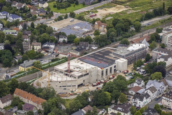 Aerial view, construction site and new building shopping centre, formerly Mühle Bremme site, Unna, Ruhr area, North Rhine-Westphalia, Germany, construction work, construction area, construction site, building plots, construction measure, construction project, construction site, DE, shopping centre, Europe, Kantstraße, aerial view, aerial photography, aerial photography, new building, postal stairs, overview, bird's eye view, overview
