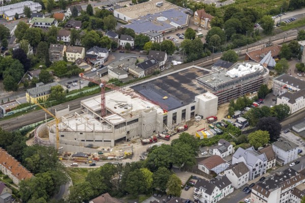 Aerial view, construction site and new building shopping centre, formerly Mühle Bremme site, Unna, Ruhr area, North Rhine-Westphalia, Germany, construction work, construction area, construction site, building plots, construction measure, construction project, construction site, DE, shopping centre, Europe, Kantstraße, aerial view, aerial photography, aerial photography, new building, postal stairs, overview, bird's eye view, overview