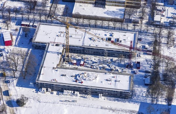 Aerial view, construction site Berliner Allee building with further education centre, educational campus, Königsborn, Unna, Ruhr area, North Rhine-Westphalia, Germany, education, educational institution, DE, Europe, teaching institute, aerial view, aerial photography, aerial photography, snow, school, overview, bird's eye view, winter, winter slump, winter landscape, birds-eyes view, overview