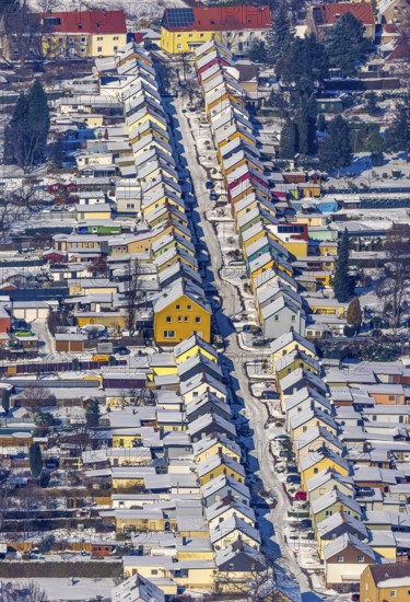 Aerial view, Friedrichstraße colliery housing estate, coloured house facades in the snow, Königsborn, Unna, Ruhr area, North Rhine-Westphalia, Germany, DE, detached houses, Europe, property tax, real estate, aerial view, aerial photography, aerial photography, terraced houses, snow, overview, bird's-eye view, winter, winter slump, winter landscape, housing estate, living and living, residential area, residential houses, quality of living, residential quarter, housing estate, birds-eyes view, overview