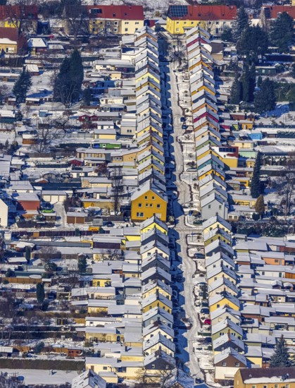Aerial view, Friedrichstraße colliery housing estate, coloured house facades in the snow, Königsborn, Unna, Ruhr area, North Rhine-Westphalia, Germany, DE, detached houses, Europe, property tax, real estate, aerial view, aerial photography, aerial photography, terraced houses, snow, overview, bird's-eye view, winter, winter slump, winter landscape, housing estate, living and living, residential area, residential houses, quality of living, residential quarter, housing estate, birds-eyes view, overview