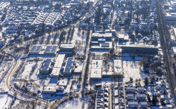 Aerial view, construction site Berliner Allee building with further education centre, educational campus, Königsborn, Unna, Ruhr area, North Rhine-Westphalia, Germany, education, educational institution, DE, Europe, teaching institute, aerial view, aerial photography, aerial photography, snow, school, overview, bird's eye view, winter, winter slump, winter landscape, birds-eyes view, overview