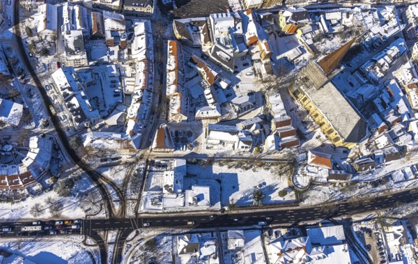 Aerial view, renovation building site Evang. Stadtkirche, editorial building Hellweger Anzeiger, publishing house Rubens, old town, Unna, Ruhr area, North Rhine-Westphalia, Germany, place of worship, construction work, construction area, construction site, construction project, construction site, DE, Europe, religious community, place of worship, church, parish, church square, denomination, aerial photograph, aerial photography, aerial photography, religion, renovation, renovation, snow, overview, bird's eye view, winter, onset of winter, winter landscape, birds-eyes view, overview