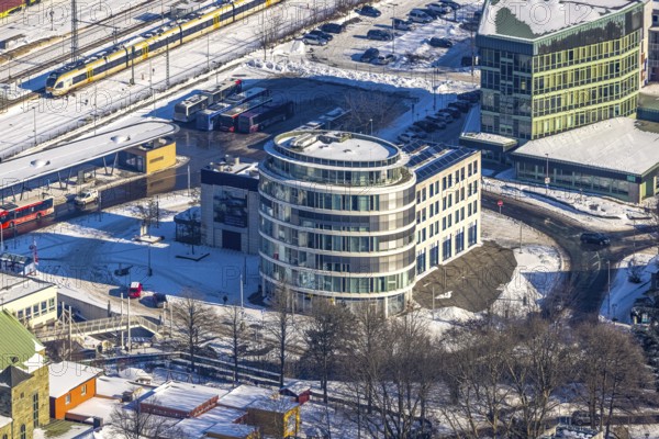 Aerial view, Unna railway station, Unna, Ruhr area, North Rhine-Westphalia, Germany, railway tracks, railway station, Bahnhofstraße, station forecourt, bus station, DE, Deutsche Bahn AG, Europe, railway tracks, main station, Kantstraße, aerial view, aerial photography, aerial photography, snow, overview, bird's-eye view, winter, onset of winter, winter landscape, ZOB, trains, birds-eyes view, overview
