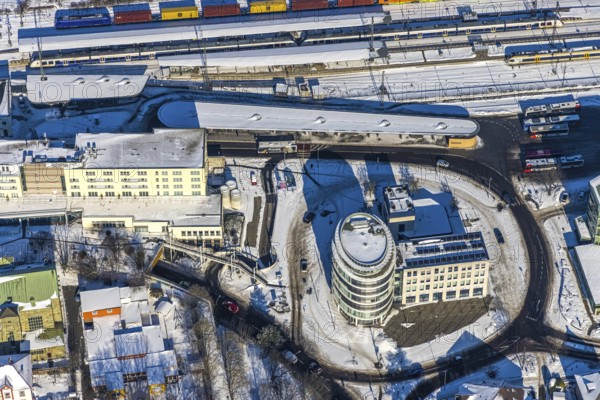 Aerial view, Unna railway station, Hotel Katharinen Hof, Unna, Ruhr area, North Rhine-Westphalia, Germany, railway tracks, railway station, Bahnhofstraße, station forecourt, bus station, DE, Deutsche Bahn AG, Europe, gastronomy, railway tracks, central station, main station, hotel, hotel facilities, hotel business, Kantstraße, Katharinen Hof, aerial view, aerial photography, aerial photography, snow, overview, bird's-eye view, winter, onset of winter, winter landscape, ZOB, trains, birds-eyes view, overview