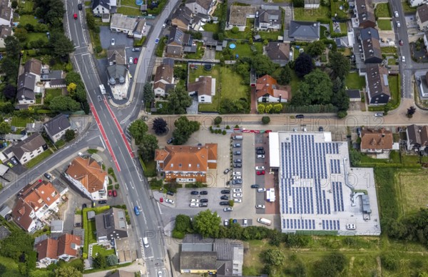 Aerial view, Rewe supermarket with solar roof, dimensions, Unna, Ruhr area, North Rhine-Westphalia, Germany, DE, shopping markets, shopping place, shopping centre, Europe, aerial view, aerial photography, aerial photography, local supply centre, photovoltaic, photovoltaic system, solar, solar system, solar roof, solar energy, solar energy, overview, bird's-eye view, overview