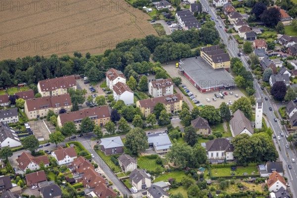 Aerial view, Edeka supermarket, Friedenskirche Maßen, Maßen, Unna, Ruhr area, North Rhine-Westphalia, Germany, place of worship, DE, shopping place, shopping centre, Europe, religious community, place of worship, holy place, church, parish, denomination, aerial view, aerial photography, aerial photography, local supply centre, religion, religious site, supermarket, overview, bird's-eye view, overview