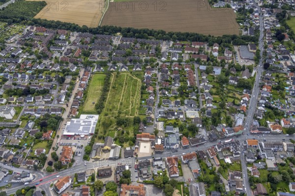 Aerial view, Rewe supermarket with solar roof, Massener Hellweg, Maßen, Unna, Ruhr area, North Rhine-Westphalia, Germany, DE, shopping markets, shopping place, shopping centre, Europe, aerial view, aerial photography, aerial photography, local supply centre, photovoltaic, photovoltaic system, solar, solar system, solar roof, solar energy, solar energy, overview, bird's-eye view, birds-eyes view, overview