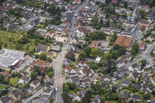 Aerial view, Rewe supermarket with solar roof, Massener Hellweg, primary school Schillerschule, Maßen, Unna, Ruhr area, North Rhine-Westphalia, Germany, education, educational institution, DE, shopping markets, shopping square, shopping centre, Europe, primary school, educational institute, aerial view, aerial photography, aerial photography, local supply centre, photovoltaics, photovoltaic system, school, solar, solar system, solar roof, solar energy, solar energy, overview, bird's eye view, birds-eyes view, overview