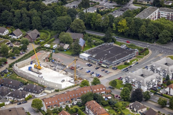 Aerial view, Edeka supermarket and construction site and new building Norma, Am Kastanienhof, Unna, Ruhr area, North Rhine-Westphalia, Germany, construction work, construction area, construction site, building plots, construction crane, construction project, construction site, DE, Europe, aerial view, aerial photography, aerial photography, new building, overview, bird's-eye view, overview