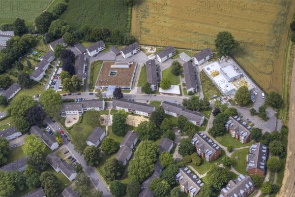 Aerial view, Buderuskolonie, Campus Unna Hochschulcampus, construction site at Lippestraße, Maßen, Unna, Ruhr area, North Rhine-Westphalia, Germany, construction work, construction area, building site, building plots, construction measure, construction project, building site, education, educational institution, DE, Europe, university, university of applied management, teaching institute, aerial view, aerial photography, aerial photography, new building, overview, bird's eye view, overview