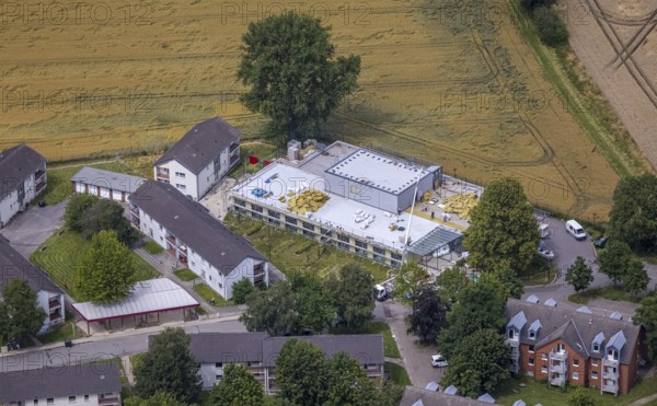 Aerial view, Buderuskolonie, Campus Unna Hochschulcampus, construction site at Lippestraße, Maßen, Unna, Ruhr area, North Rhine-Westphalia, Germany, construction work, construction area, building site, building plots, construction measure, construction project, building site, education, educational institution, DE, Europe, university, university of applied management, teaching institute, aerial view, aerial photography, aerial photography, new building, overview, bird's eye view, overview