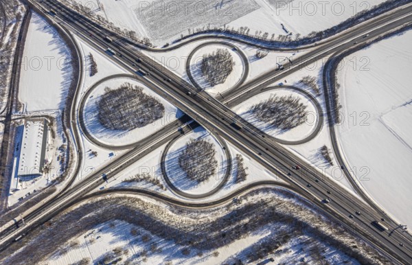 Aerial view, motorway junction Unna-Ost, Unna, Ruhr area, North Rhine-Westphalia, Germany, motorway A44, DE, Europe, shapes and colours, aerial view, aerial photography, aerial photography, snow, overview, bird's-eye view, winter, winter landscape, birds-eyes view, overview