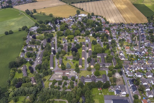 Aerial view, Buderuskolonie, Campus Unna Hochschulcampus, construction site at Lippestraße, Maßen, Unna, Ruhr area, North Rhine-Westphalia, Germany, construction work, construction area, building site, building plots, construction measure, construction project, building site, education, educational institution, DE, Europe, university, university of applied management, teaching institute, aerial view, aerial photography, aerial photography, new building, overview, bird's eye view, overview